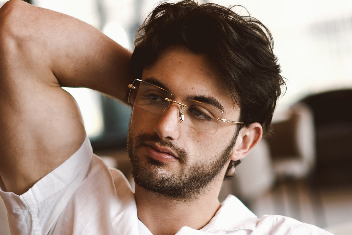 Crystal rimless sunglasses worn