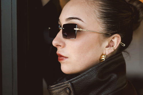 Amethyst rimless sunglasses worn