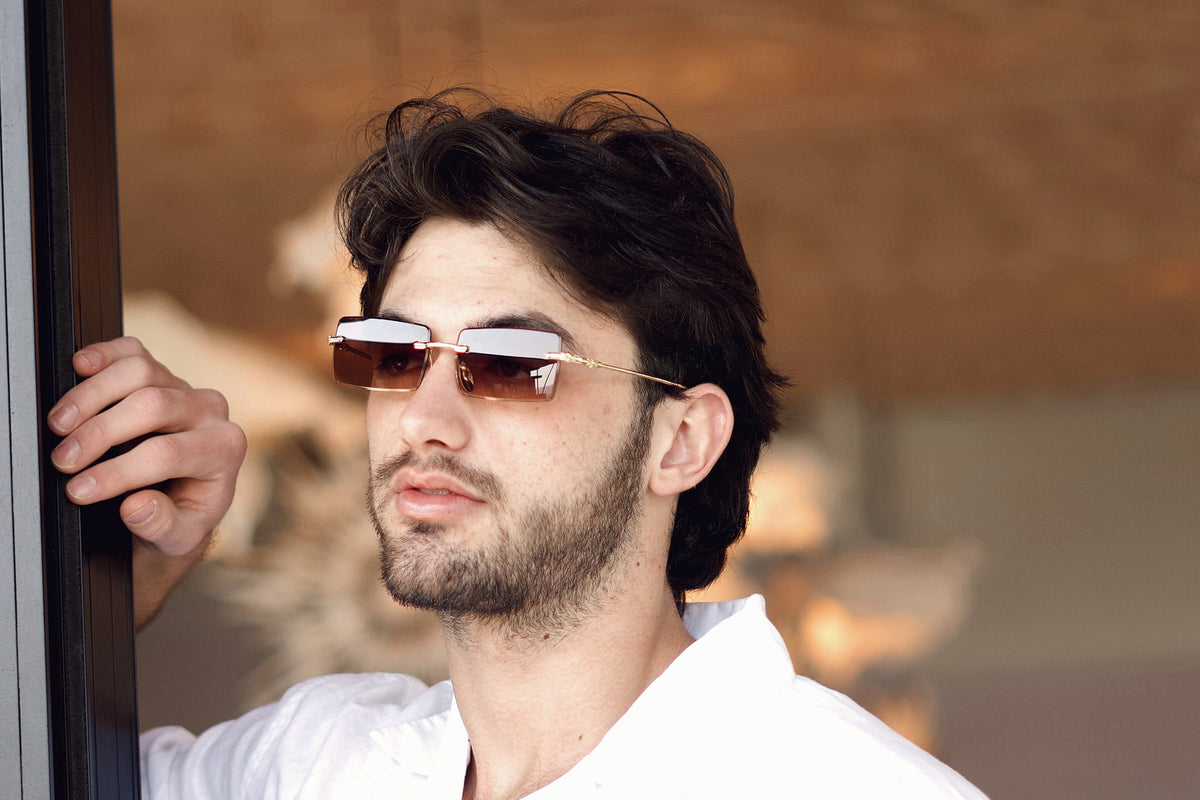 Sable rimless sunglasses worn