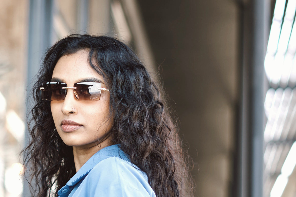 Sable rimless sunglasses worn