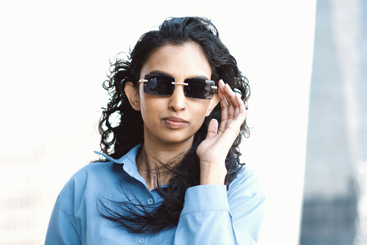 Obsidian rimless sunglasses worn