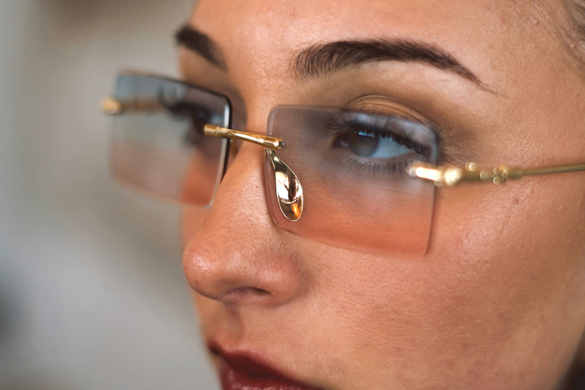 Opal rimless sunglasses worn