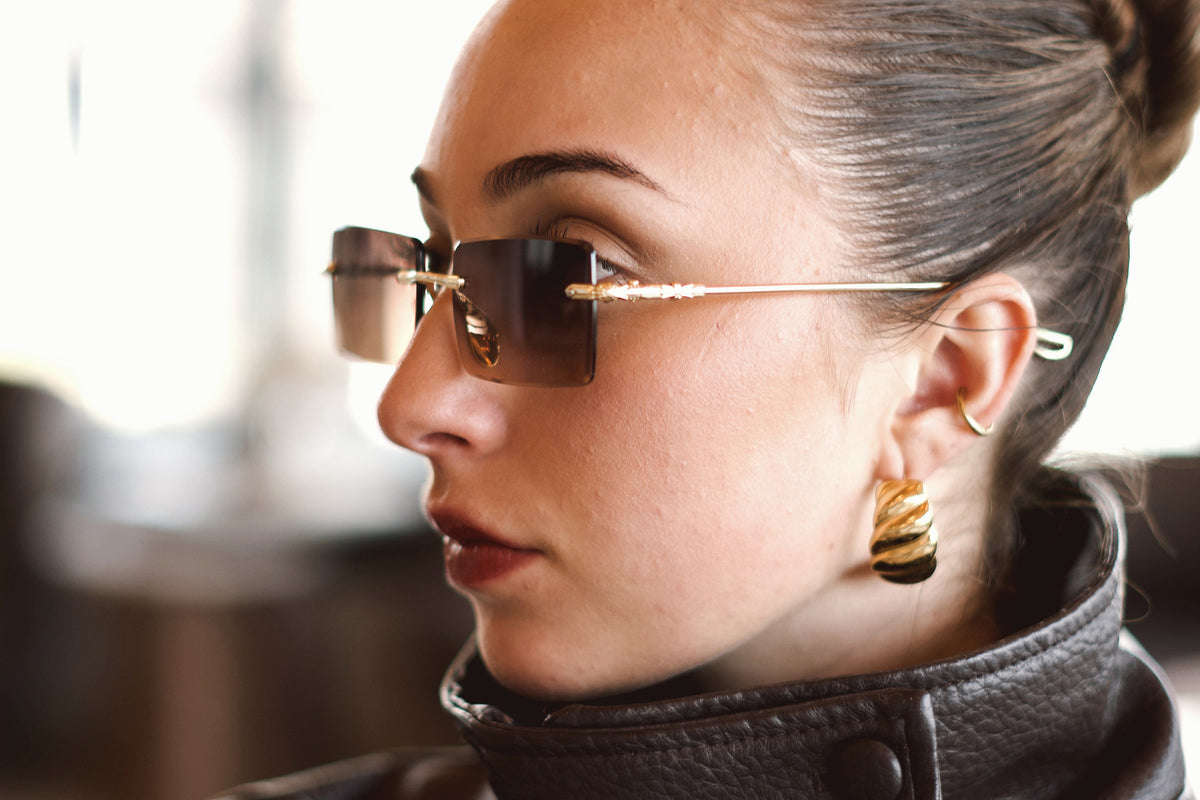 Sable rimless sunglasses worn
